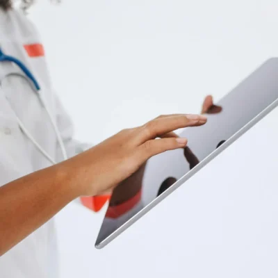 A Doctor Using a Tablet