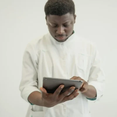 Dentist looking at an Ipad